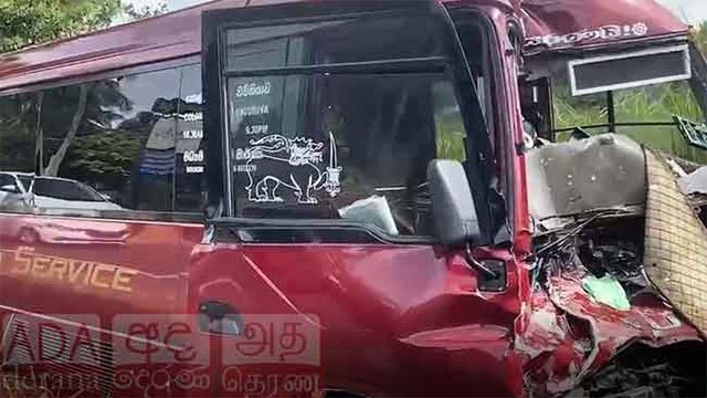 Luxury bus collides with lorry on A9 road at Maradankadawala