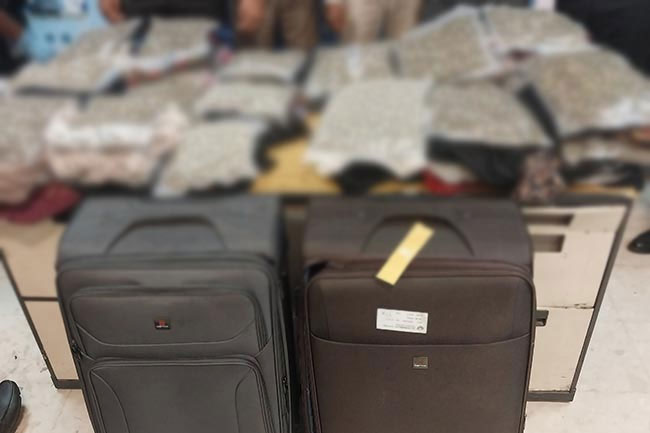 Two Sri Lankan passengers arrested at BIA with 14kg of Kush worth Rs. 140 million