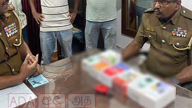 Two piriven students arrested over Rs. 1 million phone-shop burglary